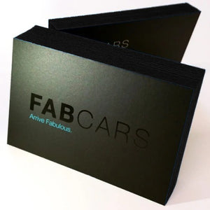 Black soft touch business cards with black painted edges and spot UV logo