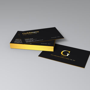 Black business cards with gold foil logo and gold coloured edges