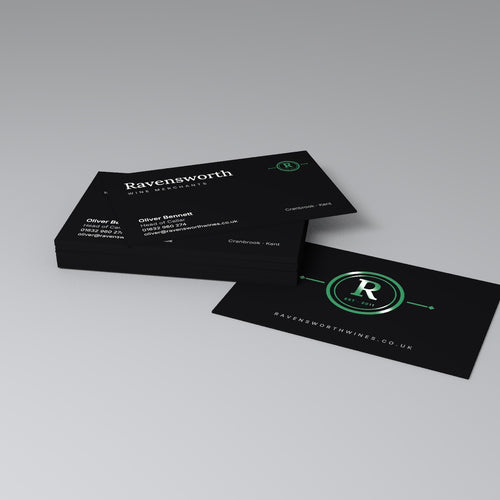 Black business cards with raised gloss spot UV logo in green