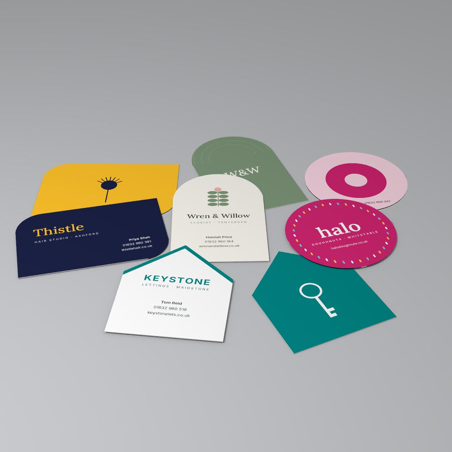 Die-cut shaped business cards: arch, circle, house and leaf shapes
